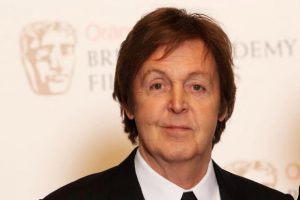 LONDON, ENGLAND - FEBRUARY 13:  (UK TABLOID NEWSPAPERS OUT) Sir Paul McCartney poses in front of the winners boards at the Orange British Academy Film Awards 2011 held at The Royal Opera House on February 13, 2011 in London, England.  (Photo by Dave Hogan/Getty Images)